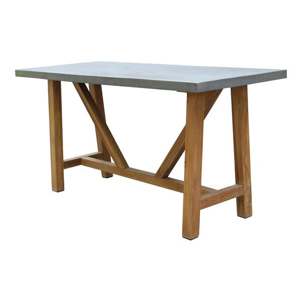An Outdoor Interiors teak and composite counter height dining table with wooden legs.