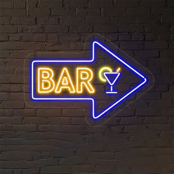 A Crazy Neon blue and yellow LED "Bar" sign with right arrow on a brick wall.