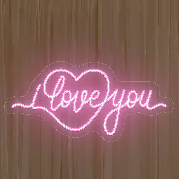 A pink Crazy Neon "I Love You" LED sign.