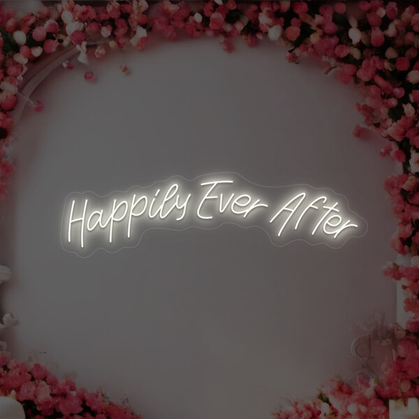 A white LED sign that says "Happily Ever After" with pink flowers around it.