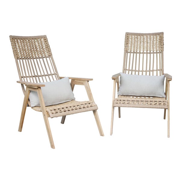 An Outdoor Interiors Teak and Wicker Bohemian Basket Lounger with a white pillow on it.