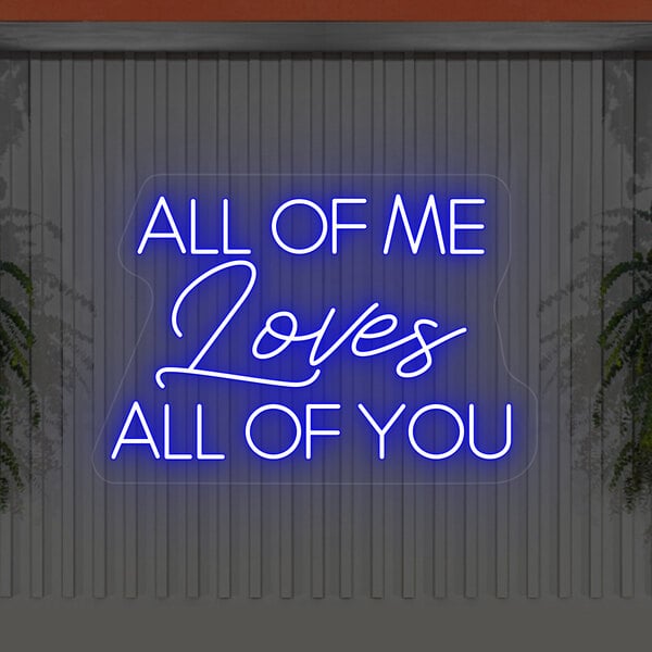 A blue neon sign that says "All Of Me Loves All Of You" with white lettering.