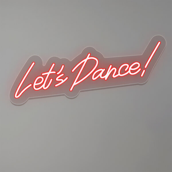 A red LED sign that says "Let's Dance!" in white text.