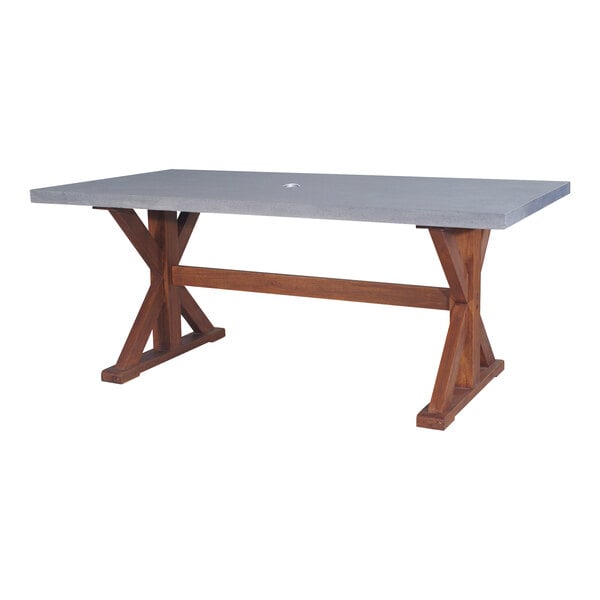 An Outdoor Interiors grey rectangular composite and eucalyptus dining table with wooden legs.