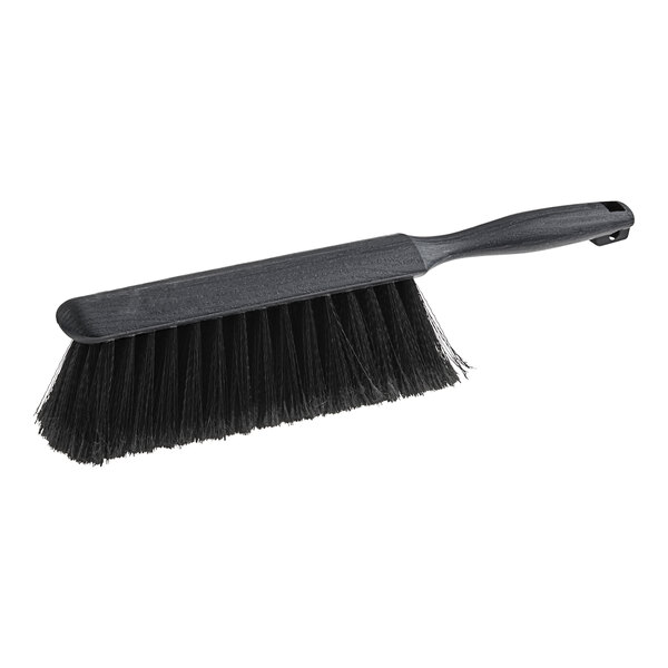 A black Lavex counter brush with a handle.
