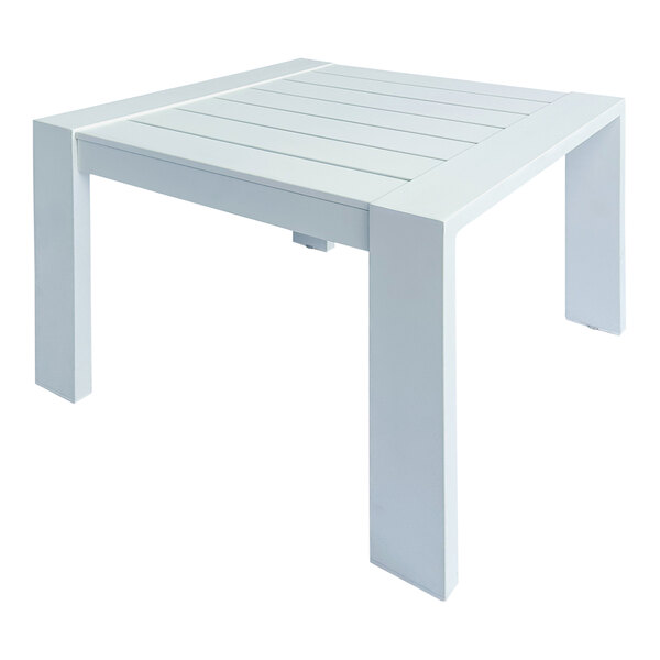 A white square table with legs.