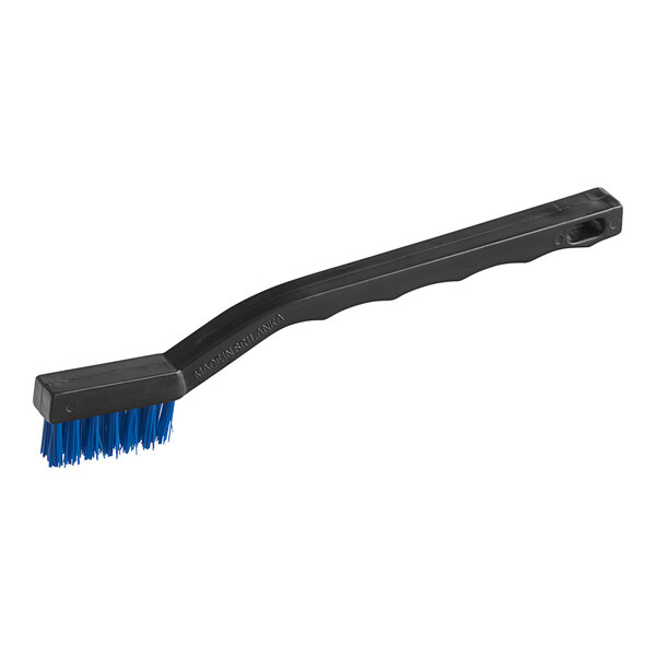 A 7 1/2 inch toothbrush style grout brush with unflagged blue polypropylene bristles and a black handle.