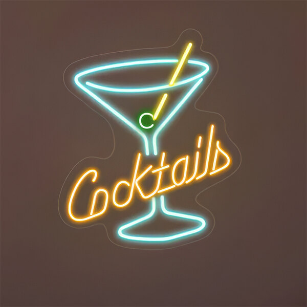 A Crazy Neon LED sign with yellow and blue text that says "Cocktails" and a martini glass.