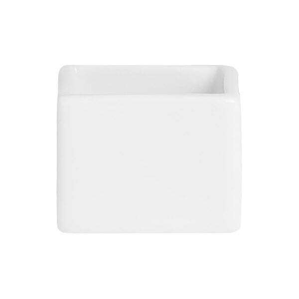 A bright white square deep ramekin on a white background.