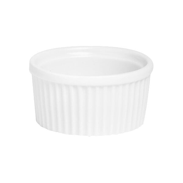 A close-up of a bright white fluted Varick ramekin.