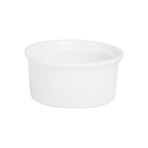 A close-up of a Varick A La Carte bright white fluted ramekin.