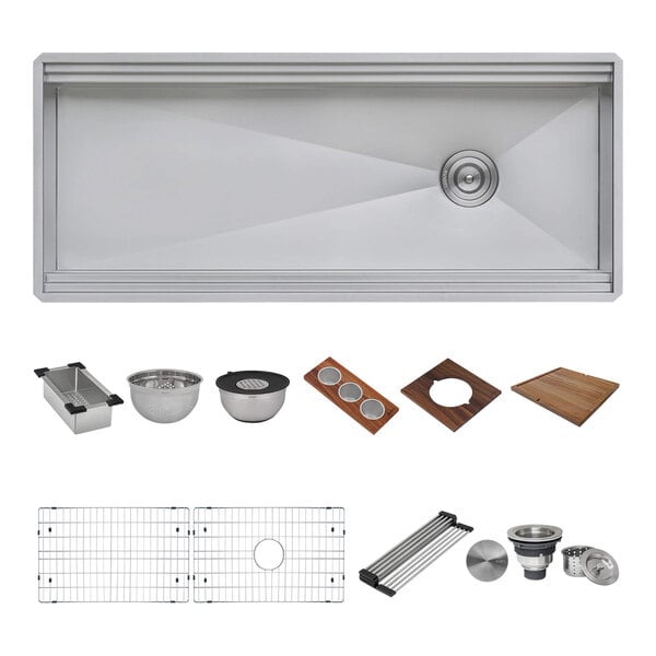 A Ruvati stainless steel workstation sink with various accessories inside.