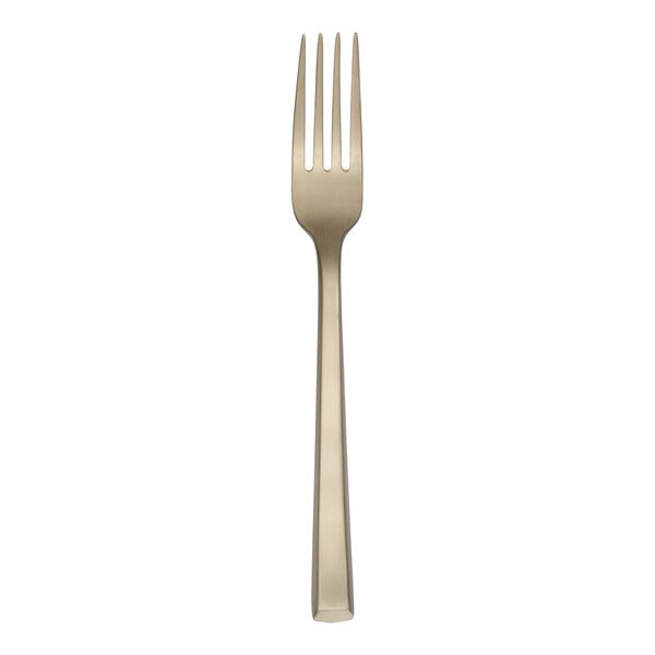 A close-up of a Reserve by Libbey Santorini Gold stainless steel dinner fork with a white background.