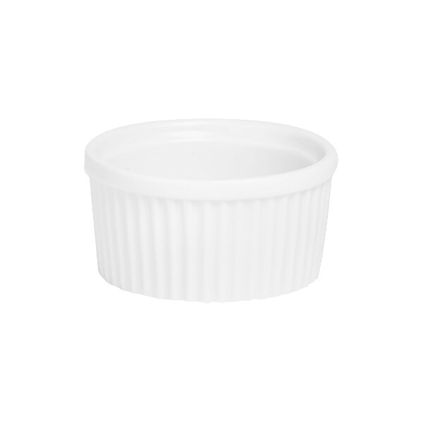 A white fluted ramekin with a white background.