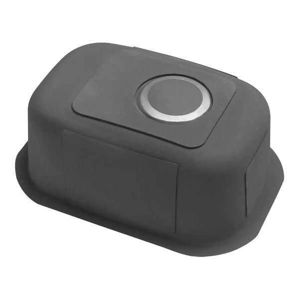 A black rectangular stainless steel sink with a round metal circle on top.