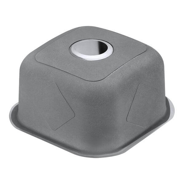A square stainless steel sink with a round hole in the center.
