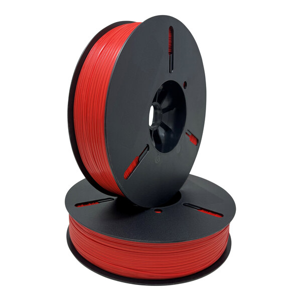 A black spool of red plastic twist tie ribbon with black text on the label.