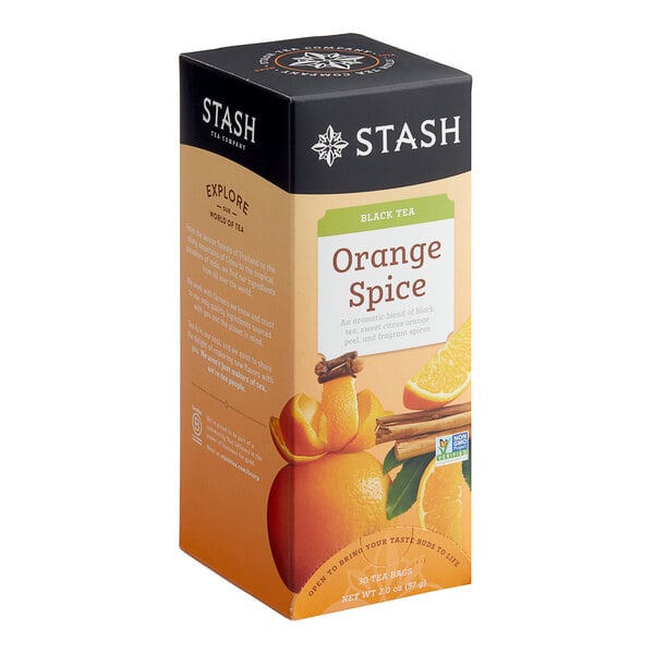 A box of Stash Orange Spice Tea Bags with oranges and cinnamon sticks.