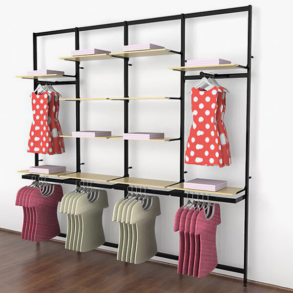 A black Udizine retail clothing display rack with clothes on hangers.