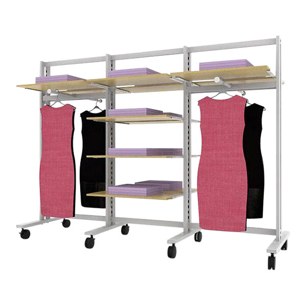 A white Udizine retail clothing display rack with shelves and pink dresses on faceouts.