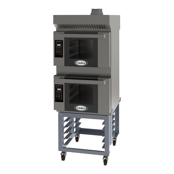 A large grey Cadco Bakerlux countertop convection oven on a stand with wheels.