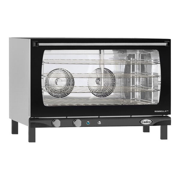 A black and silver Cadco Rossella countertop convection oven with two doors.