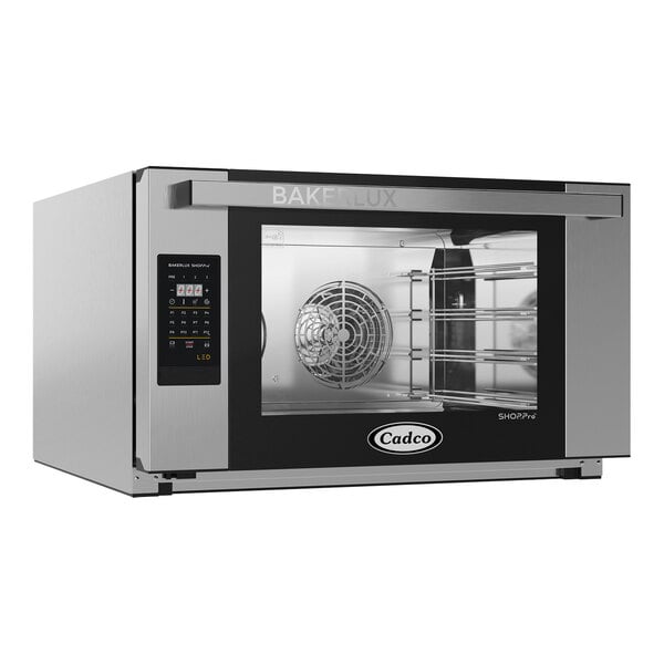 A stainless steel Cadco Bakerlux countertop convection oven with a glass door.