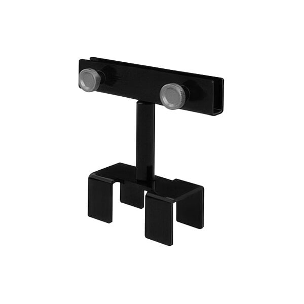 A black metal Udizine sign displayer with two round metal knobs.