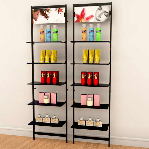 A black wall-mounted retail clothing display with two shelves holding various products.