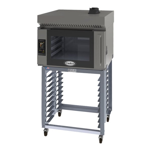 A large grey Cadco Bakerlux countertop convection oven on a stand with wheels.