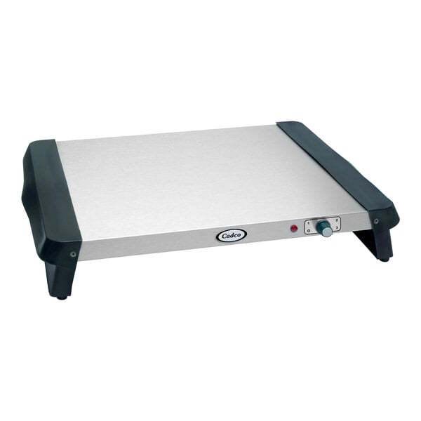 A silver and black rectangular Cadco electric countertop warming shelf with a black handle.