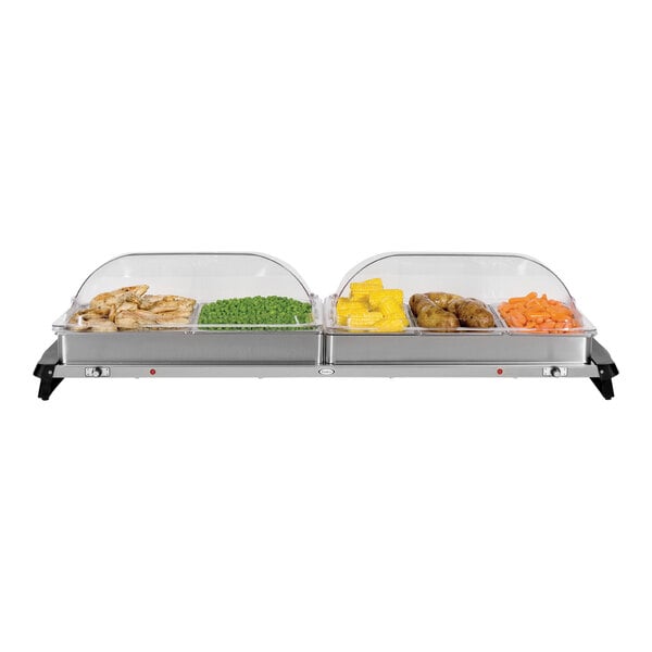 A Cadco countertop buffet server with two trays of food, including corn and peas.