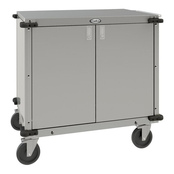 A gray metal Cadco utility cart with black wheels.