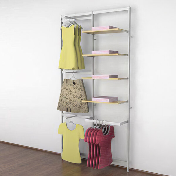 A white Udizine retail clothing display rack with clothes on hangers.