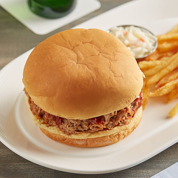 A sandwich on a plate with a Martin's Famous Sandwich Potato Roll.