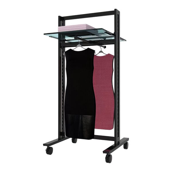 A black Udizine retail clothing display stand with 2 faceouts holding a black and white dress.