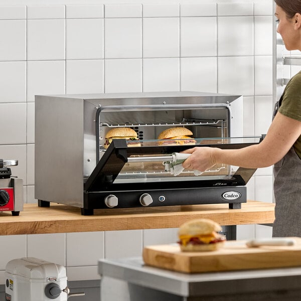 Cadco Lisa OV-013 3-Shelf Half Size Medium-Duty Manual Countertop Convection Oven - 120V