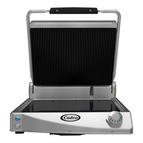 A Cadco commercial Panini grill with a black and silver grill plate.