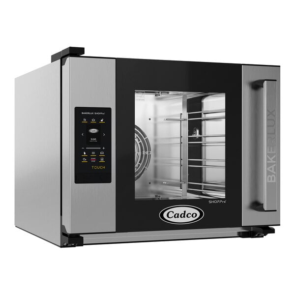 A Cadco Bakerlux countertop convection oven with a glass door and a black and silver touch control panel.