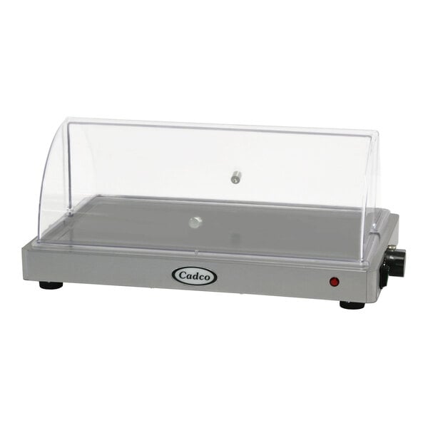 A silver and black Cadco countertop warming shelf with a roll top lid.