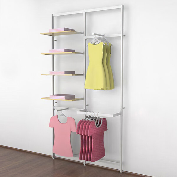 A white Udizine retail clothing display rack with clothes hanging on it.