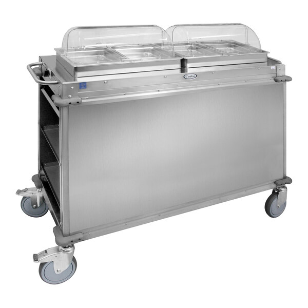 A stainless steel Cadco food cart with two heated wells.