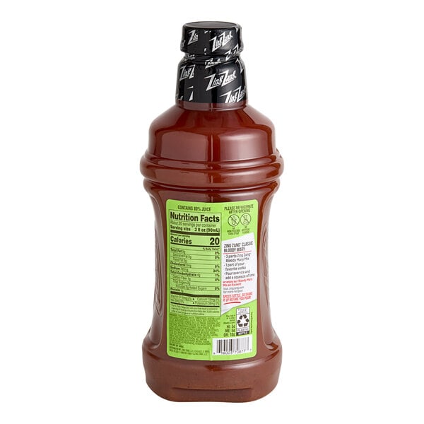 A close-up of a 1.75 liter bottle of Zing Zang Bloody Mary Mix with a label.