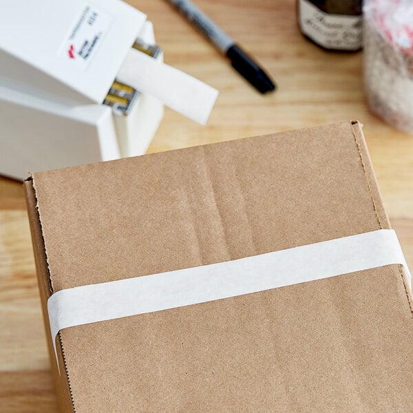 A cardboard box with white IPG Central tape on it.