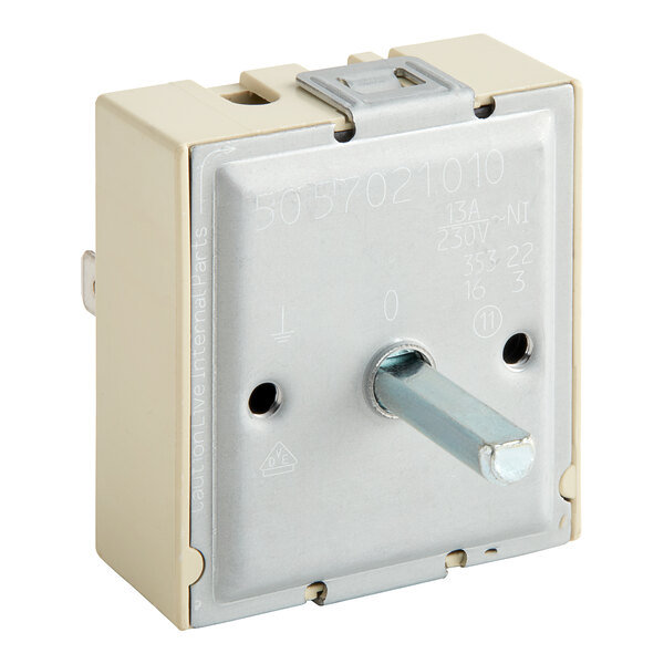 A white square Cooking Performance Group infinite switch with metal and metal parts.