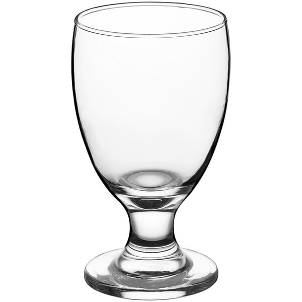 An Acopa clear glass goblet with a stem.