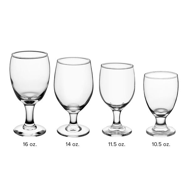 An Acopa glass goblet with a small stem on a white background.