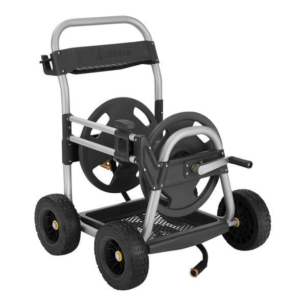 A black and grey Gorilla garden hose reel cart with wheels.