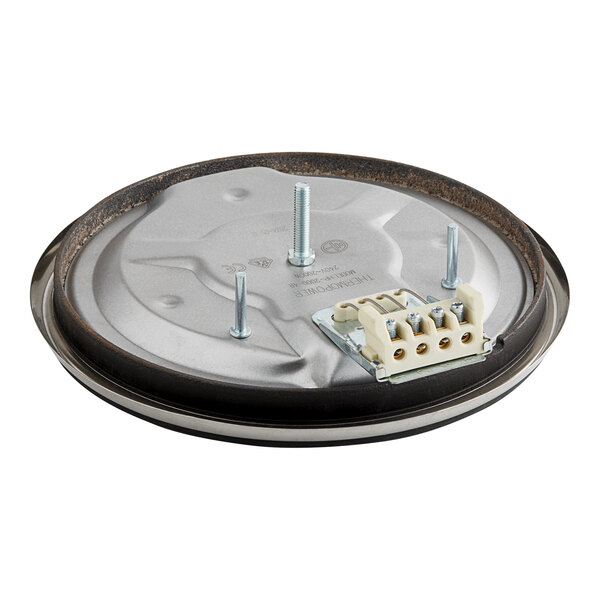 A round metal hot plate for Cooking Performance Group ranges with screws.