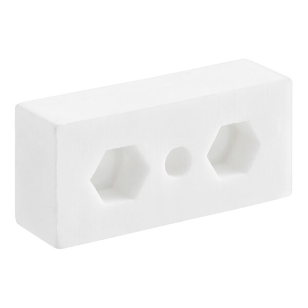 A white terminal block with holes for a Cooking Performance Group range.